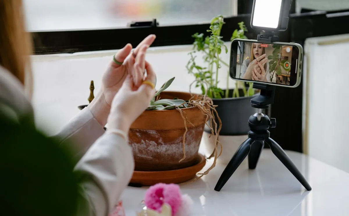 Creator vlogging with a smartphone to make short-form social videos with Muse AI Video